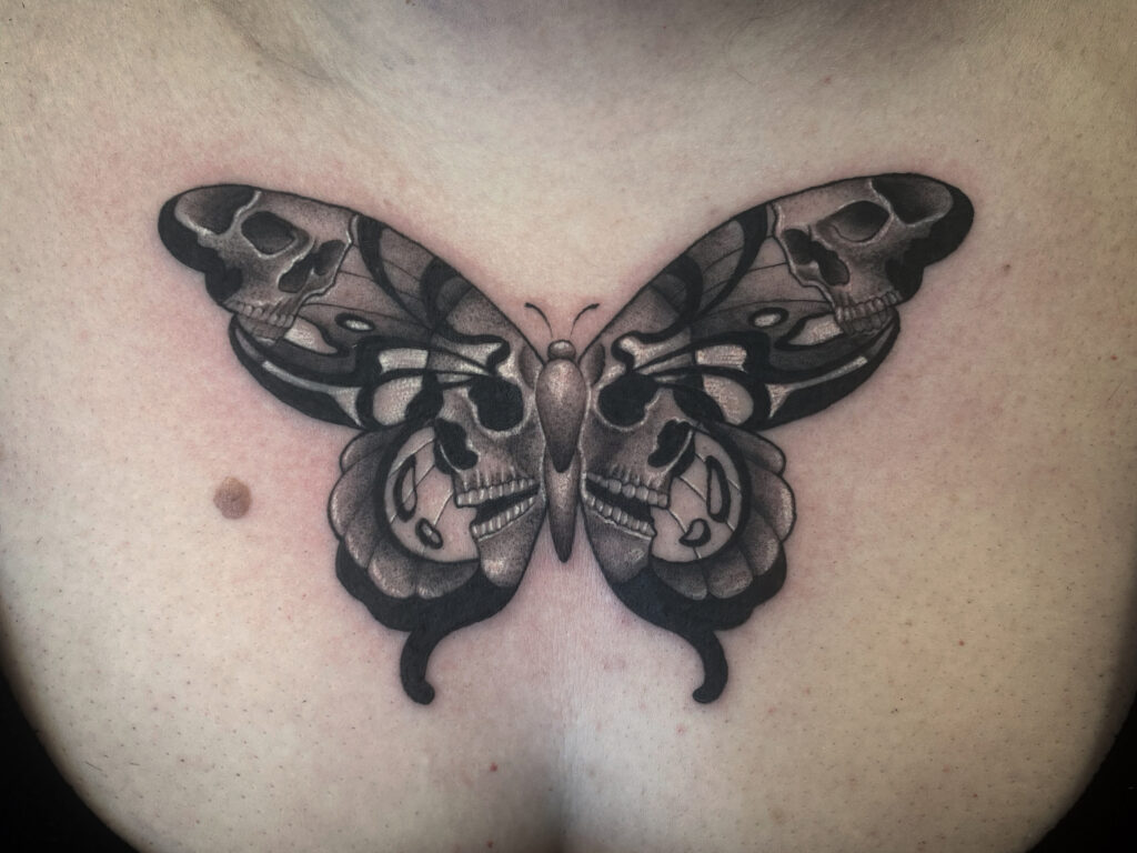 gothicskullmothchesttattoo