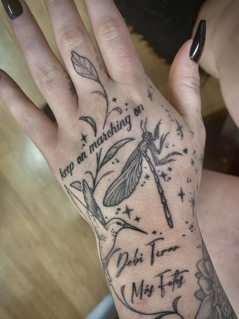 healedstickerhandtattooleft