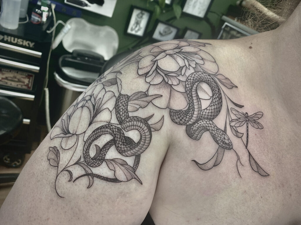 shoulderfloralsnaketattoo