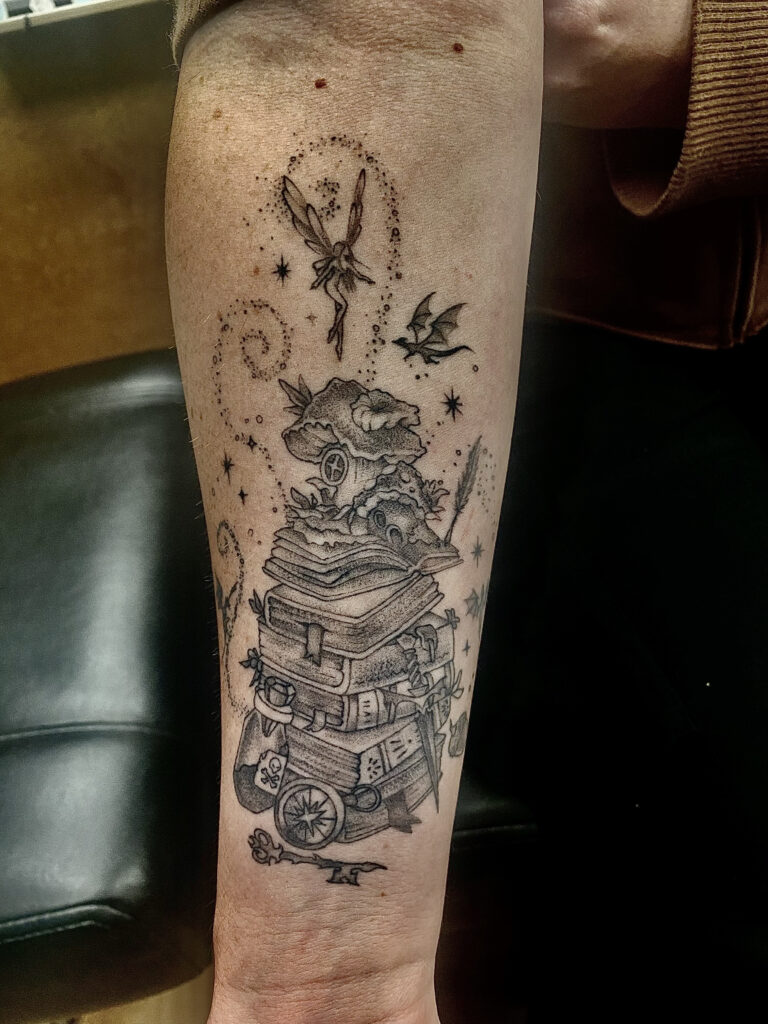 whimsicalbookstackfantasytattoo